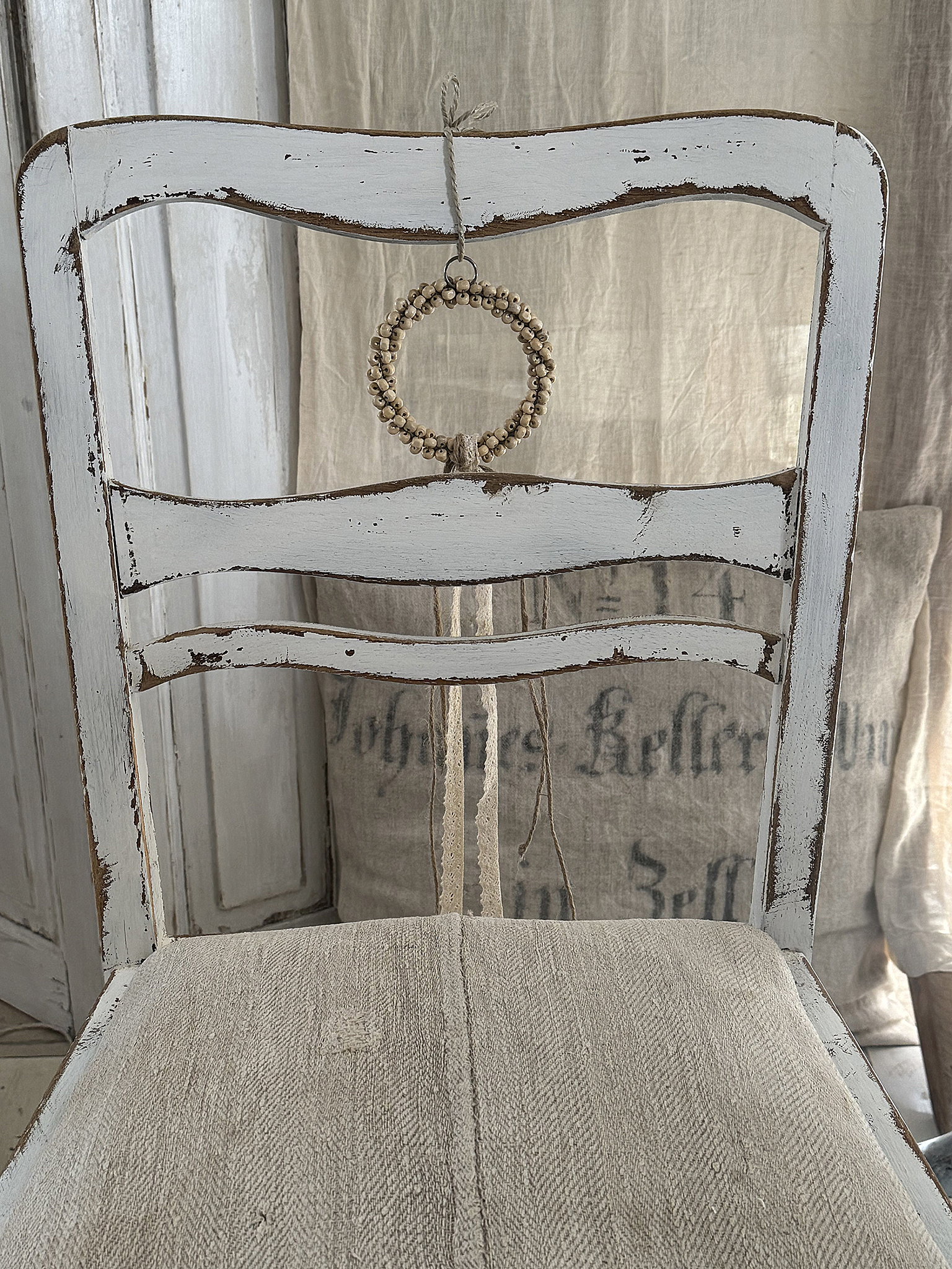 Schöner Polsterstuhl mit Bezug aus altem Leinensack***