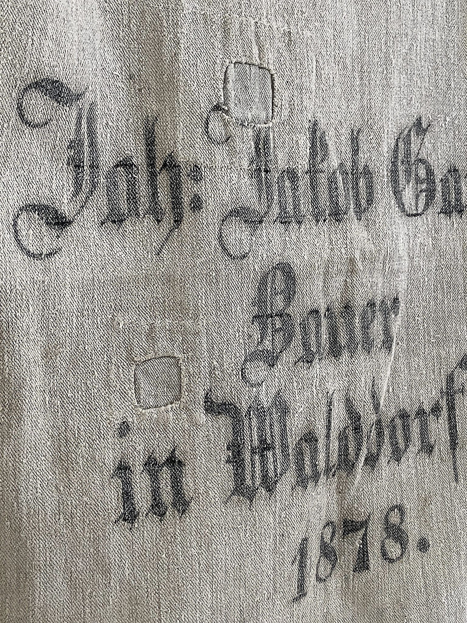 Historisches Textil mit der Jahreszahl 1878 und Namen Jakob Gautschi Detail eines alten Textils aus Waldorf mit der Inschrift von Jakob Gautschi, Jahr 1878