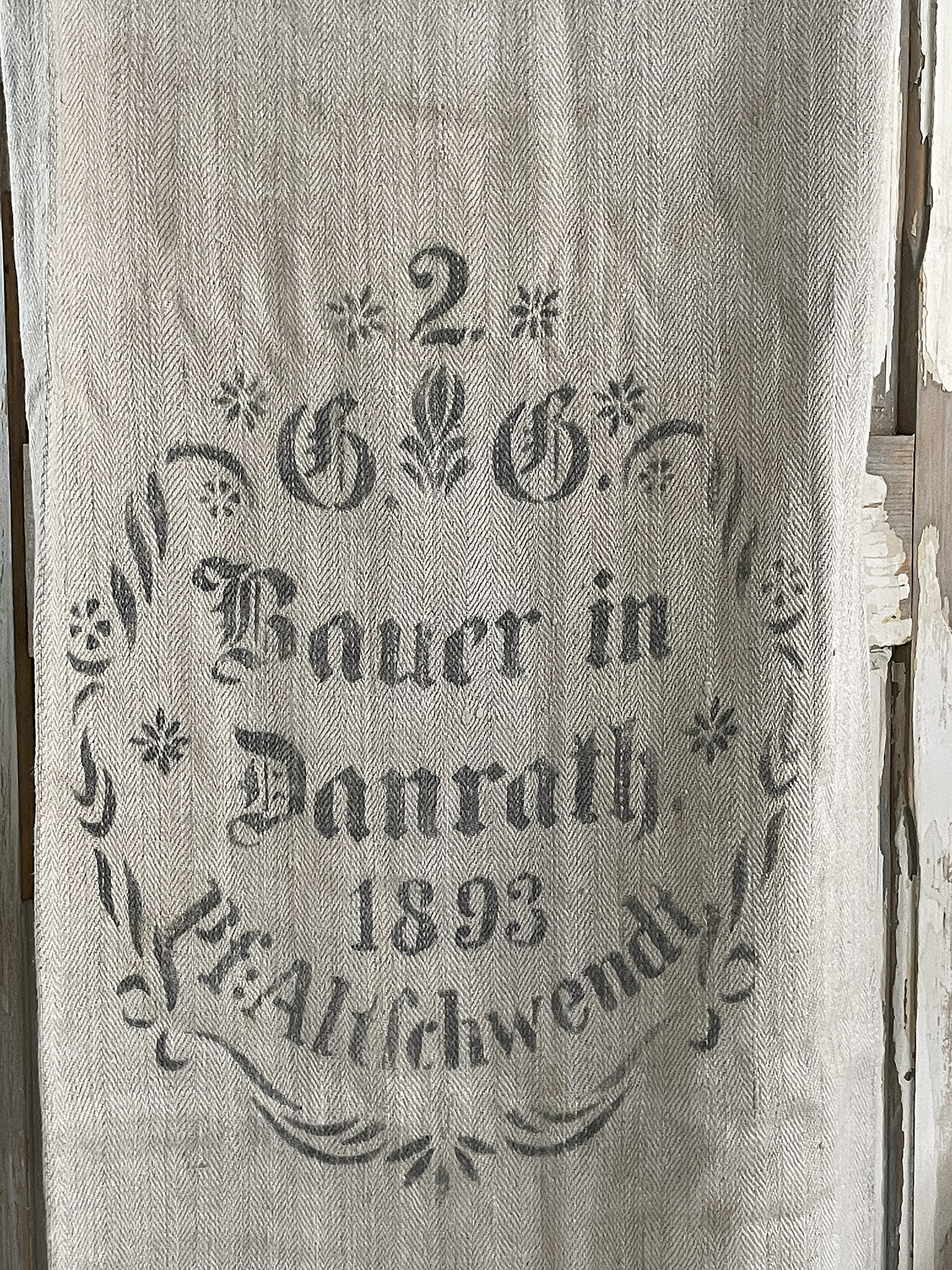 Vintage Stoff mit dem Aufdruck "Bauer in Danrath, 1893"